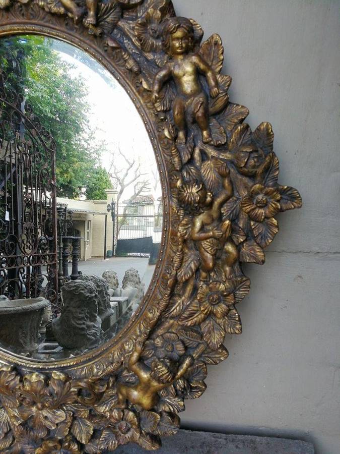 A Hand Gilded and Carved Bevelled Mirror