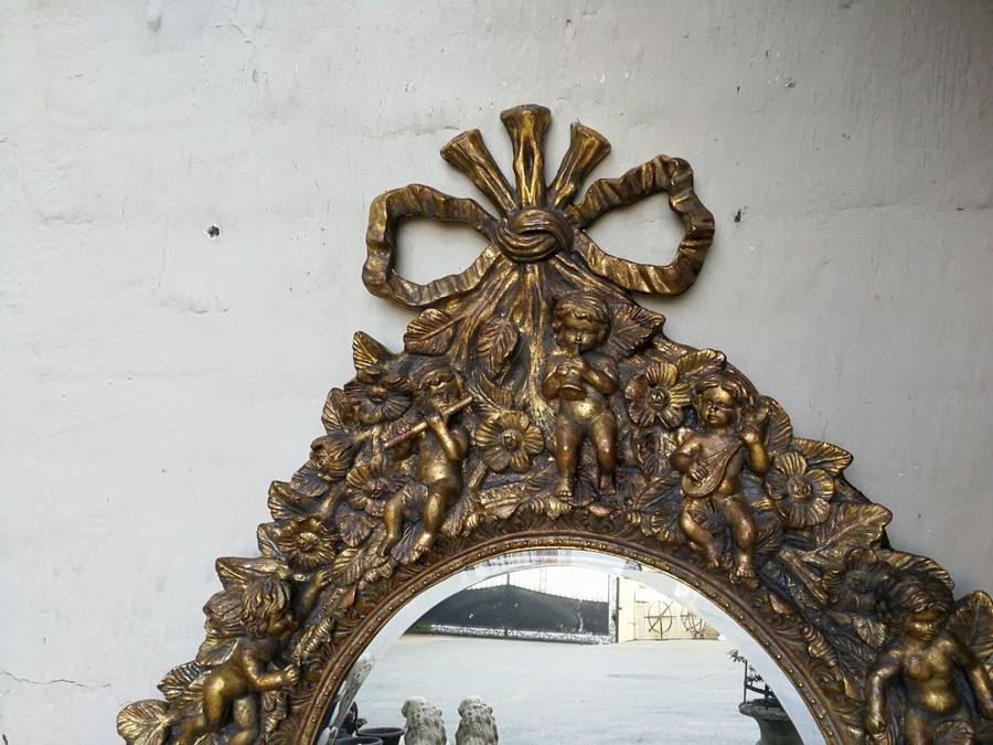 A Hand Gilded and Carved Bevelled Mirror