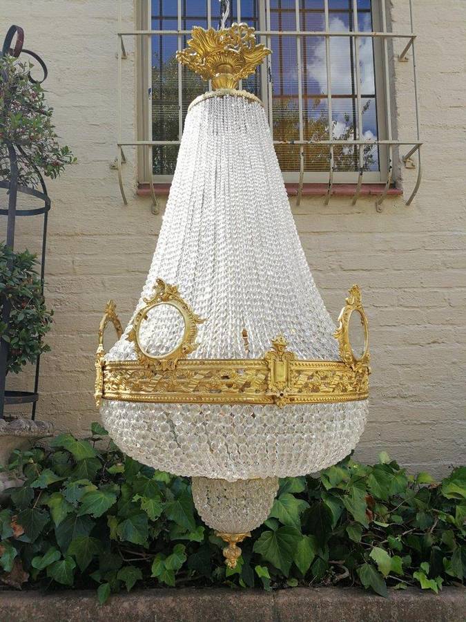 An Antique Gold Beaded Empire Style Chandelier