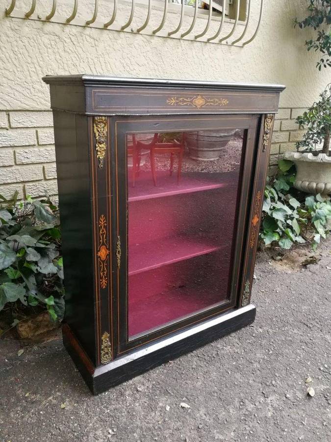 An Antique Victorian Ebonised And Marquetry Pier Cabinet With Gilt Metal Mounts And Key