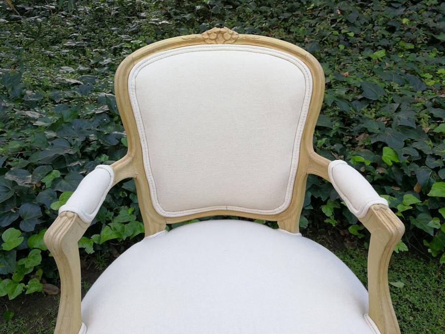 A Pair of 20th Century French Rococo Style Oak Armchairs in a bleached / natural finish