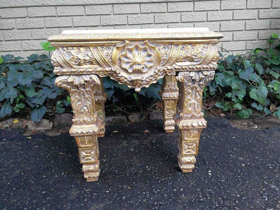 A French Style Ornately Carved Side Table