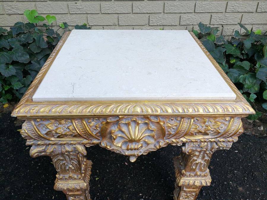 A French Style Ornately Carved Side Table