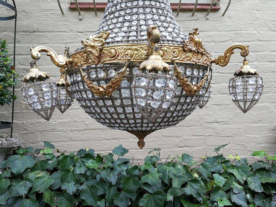 A French Empire Style Brass and Gilt Chandelier
