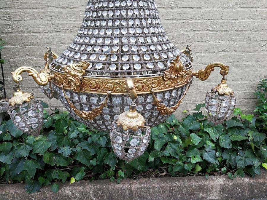 A French Empire Style Brass and Gilt Chandelier