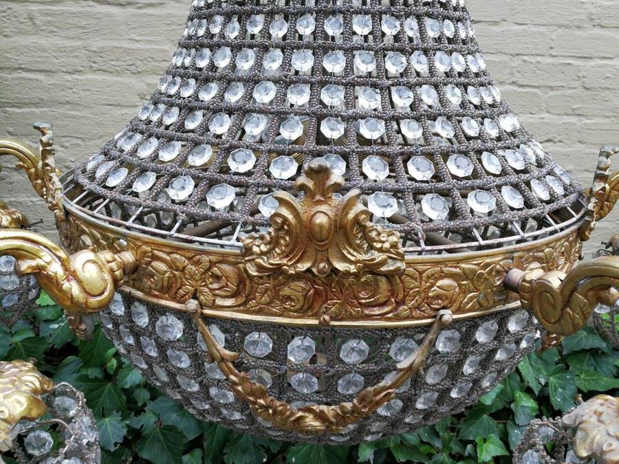 A French Empire Style Brass and Gilt Chandelier