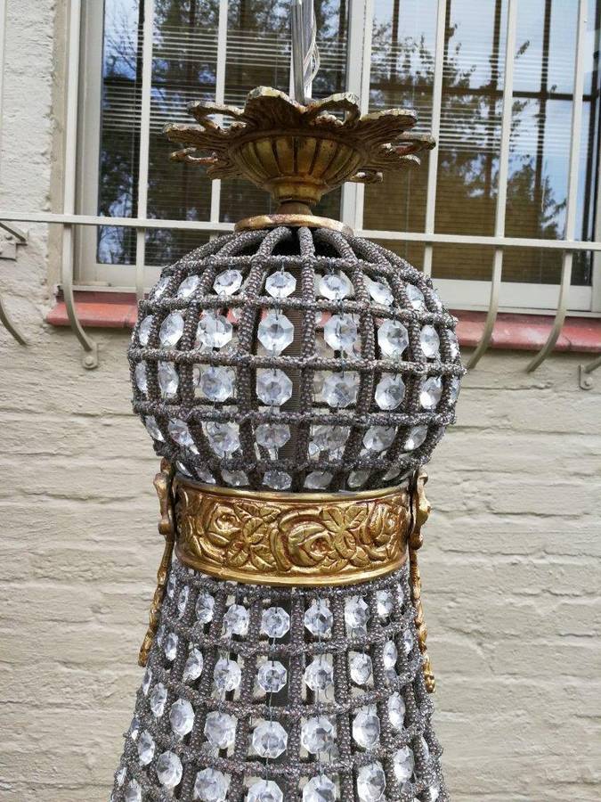 A French Empire Style Brass and Gilt Chandelier