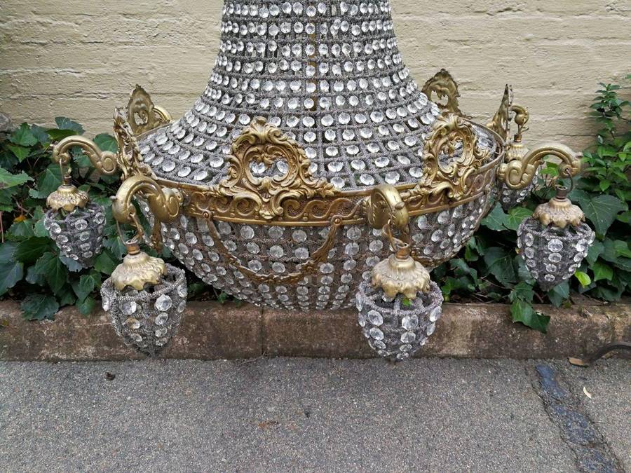 A French Empire Style Brass Gilt Chandelier