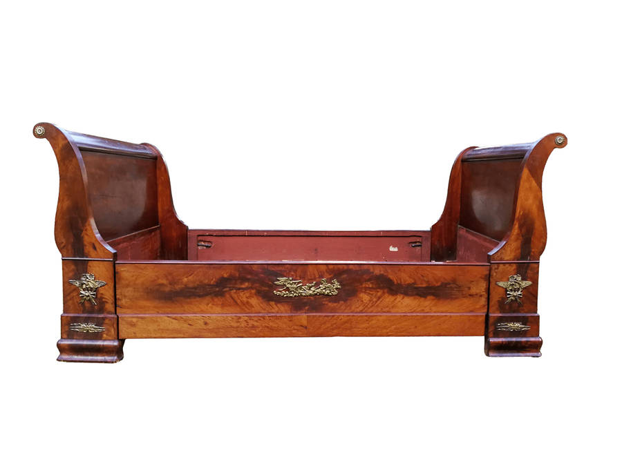 An Early 20th Century French Mahogany Lit Bateau Daybed/Bed With Gilt-Brass And Castors