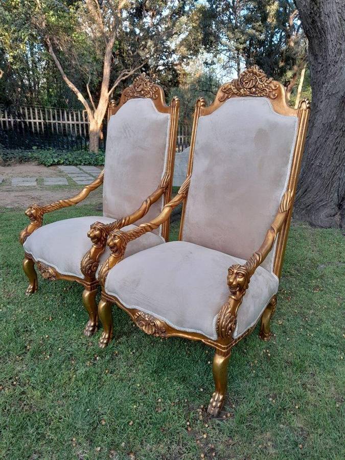 An Exceptional Pair of 20th Century French Style Ornately Carved & Giltwood Throne Chairs