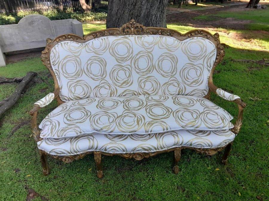 A 20TH Century French Hand Carved and Hand Gilded Settee