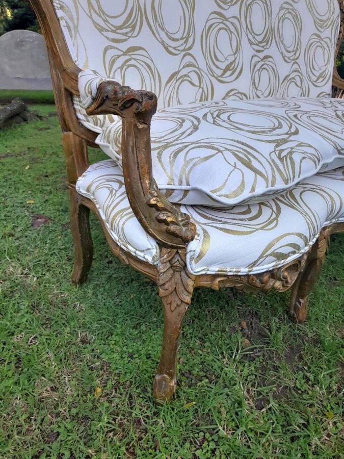 A 20TH Century French Hand Carved and Hand Gilded Settee