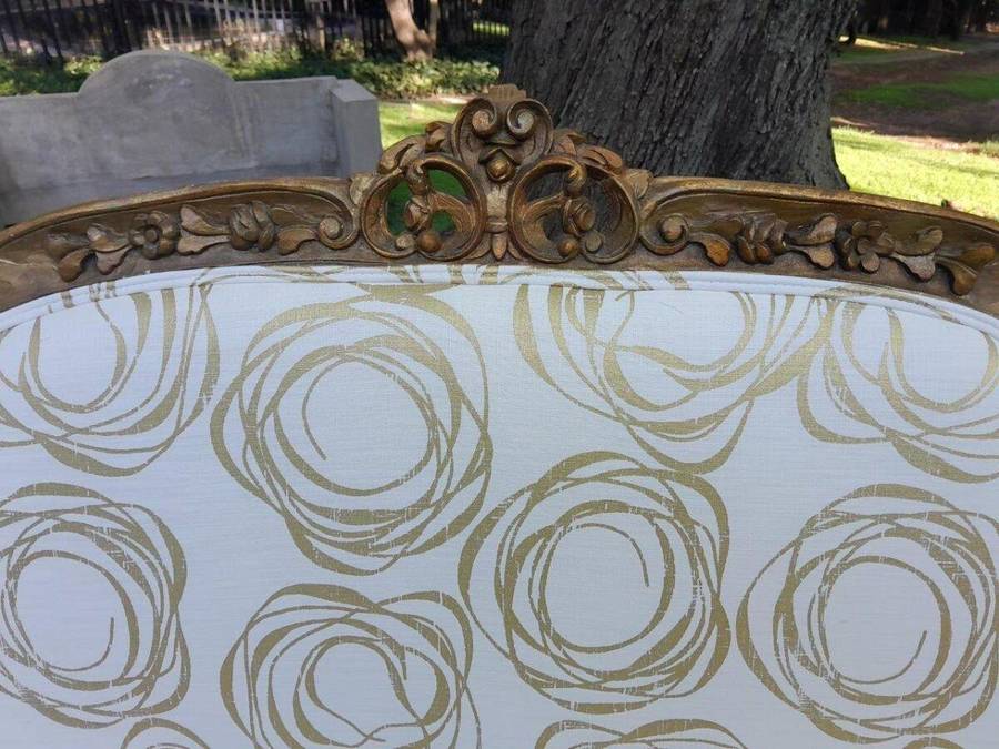 A 20TH Century French Hand Carved and Hand Gilded Settee