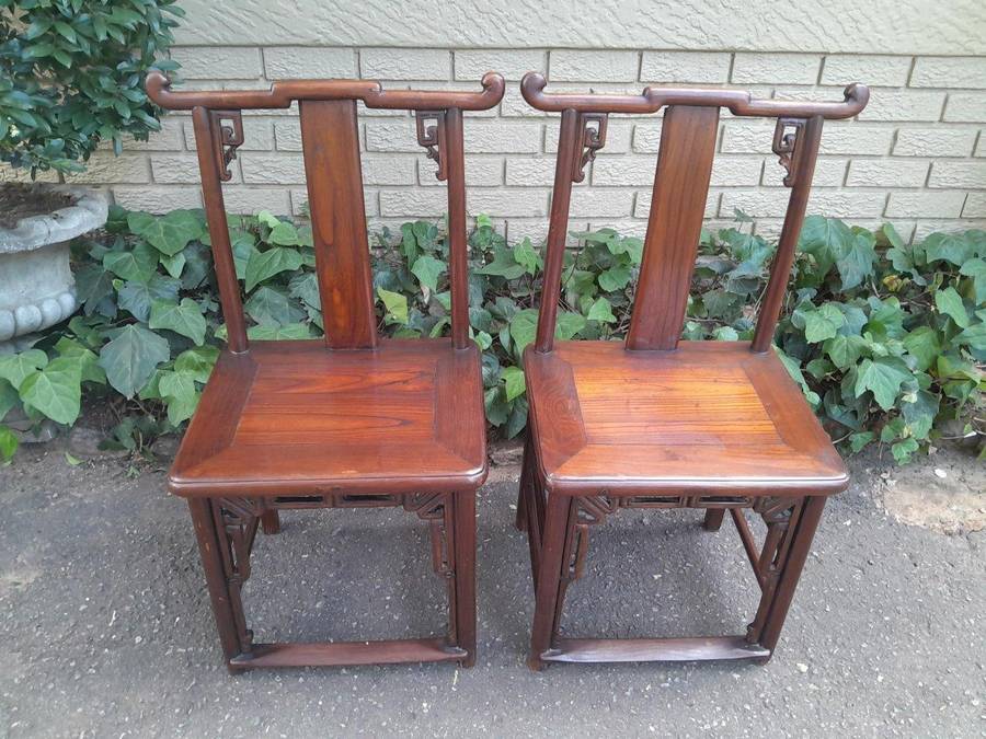 A 20th Century Pair Of Chinese Elm Yoke Back Wooden Chairs With Excellent Patina