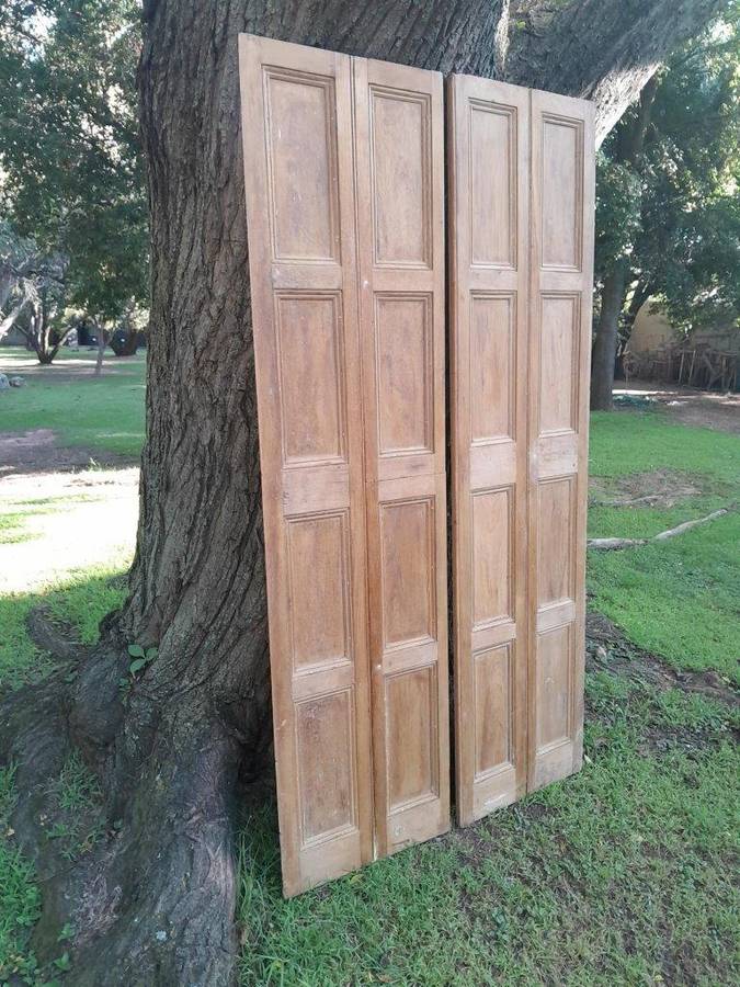 A 20th Century Pair of French Wooden Shutters with Bevelled Panels in a Contemporary Bleached Fin...