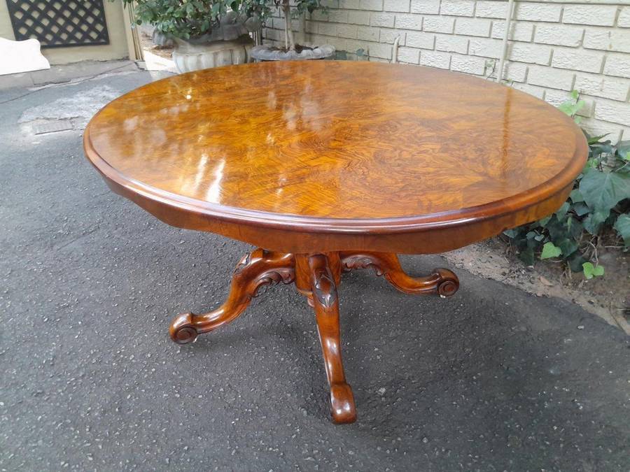 An Antique Victorian Burr Walnut Folding Table with Carved Base