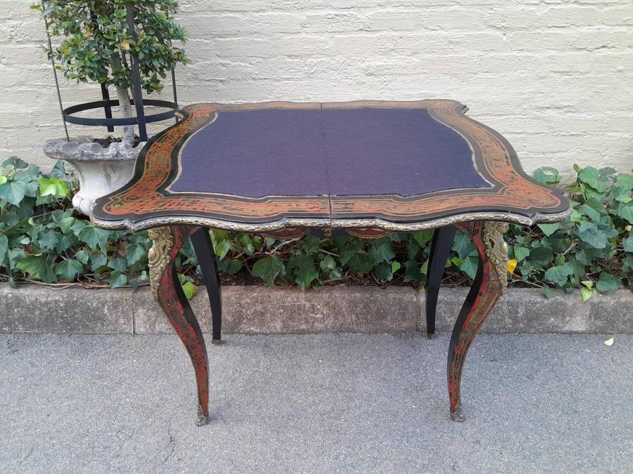 A 19th Century Boulle, Ebonised and Ormolu Mounted Cart Table