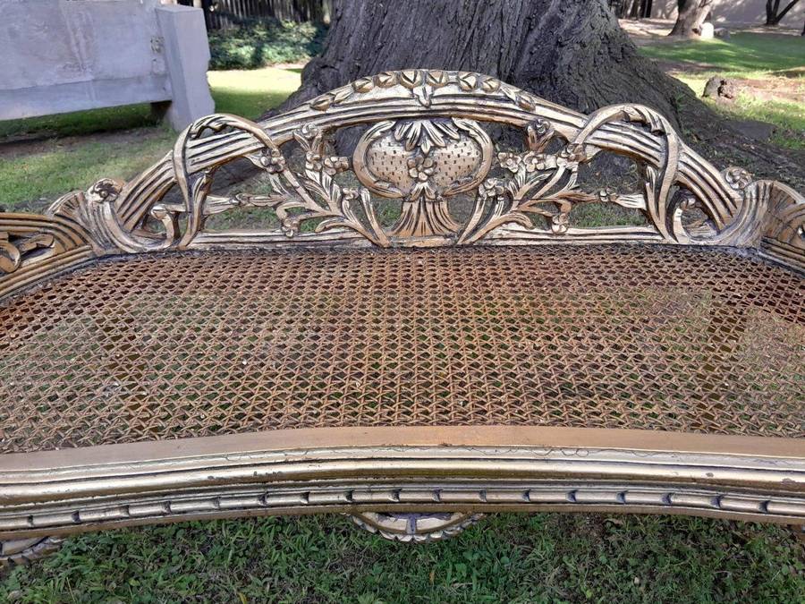 A French Style Ornately Carved and Hand- Gilded Rattan Bench / Settee