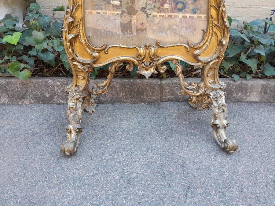 A 20TH Century French Louis XV Style Ornately Carved Giltwood Fire Screen With Tapestry