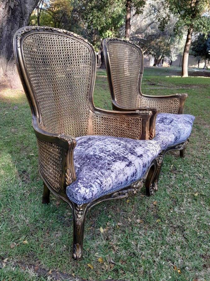 A 20th Century Pair of French Style Gilt Wood Rattan Arm Chairs