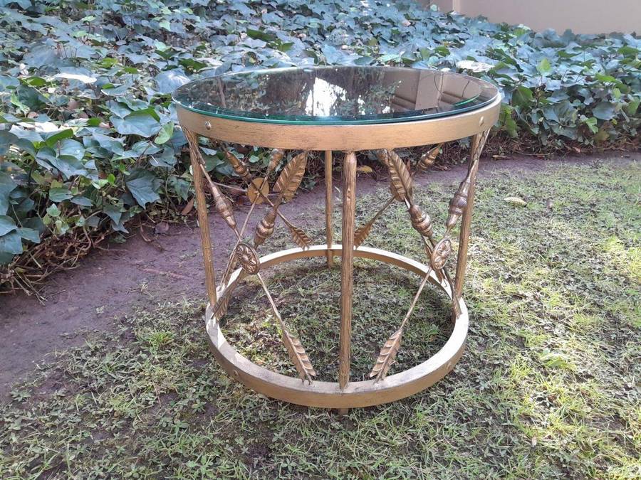 A Custom-made Gilt Metal Circulate Table with Bevelled Mirror