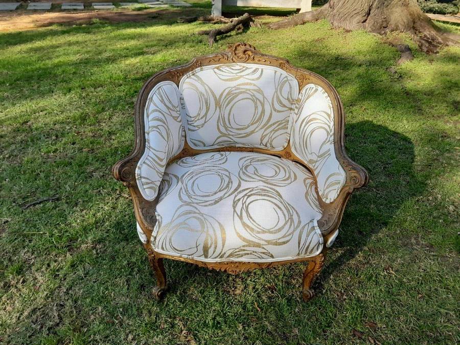 A Late 19th Century French Carved and Gilt Wood Walnut Bergere Armchair  Upholstered in  a cust...