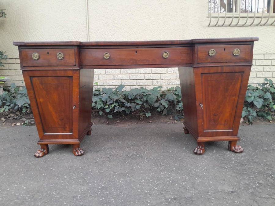 An 18th / 19th Century William IV Mahogany Sideboard With Ebony Inlay And Original Lion Claw Feet...