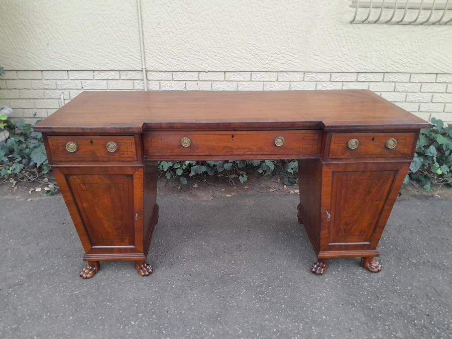 An 18th / 19th Century William IV Mahogany Sideboard With Ebony Inlay And Original Lion Claw Feet...
