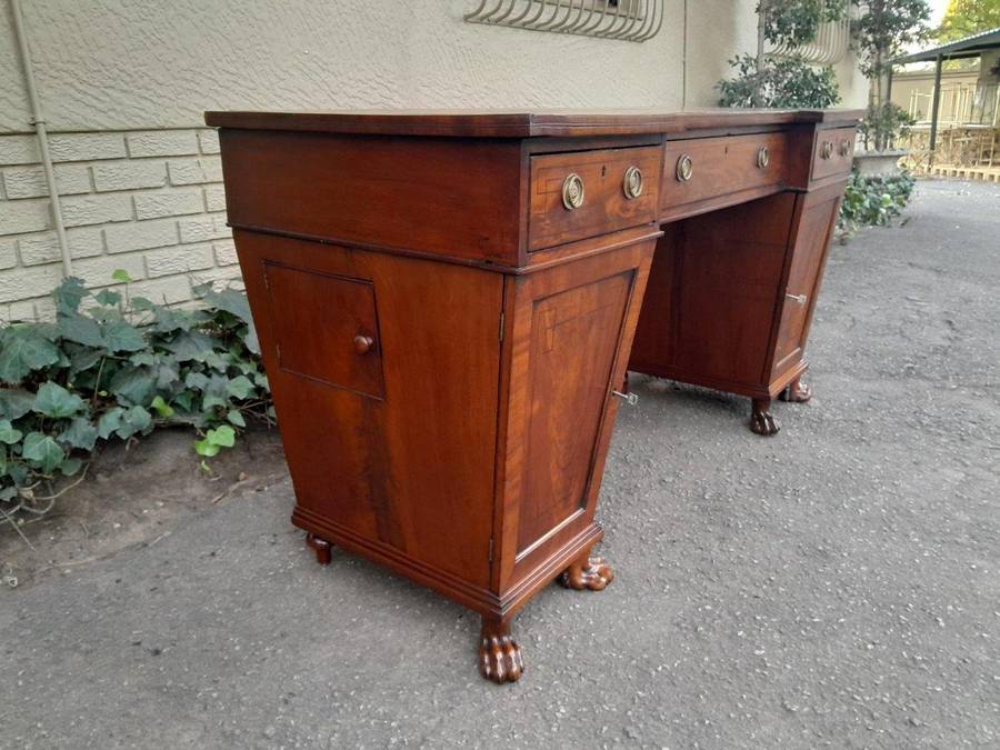 An 18th / 19th Century William IV Mahogany Sideboard With Ebony Inlay And Original Lion Claw Feet...