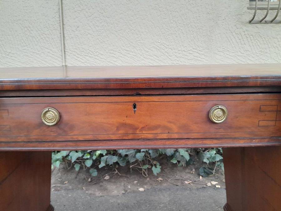 An 18th / 19th Century William IV Mahogany Sideboard With Ebony Inlay And Original Lion Claw Feet...