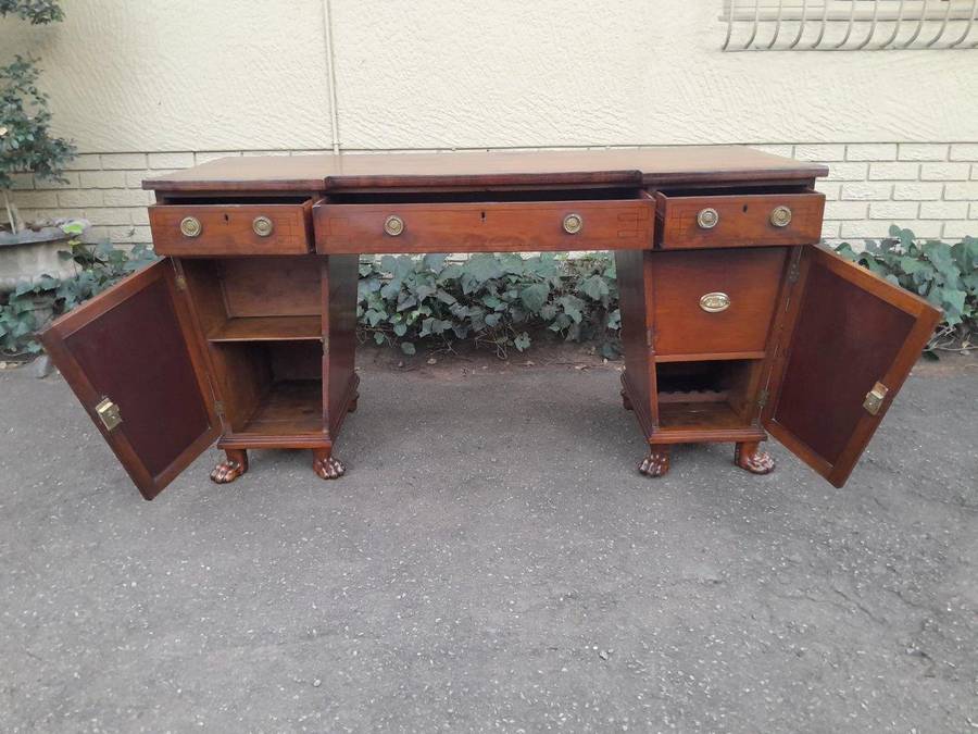 An 18th / 19th Century William IV Mahogany Sideboard With Ebony Inlay And Original Lion Claw Feet...