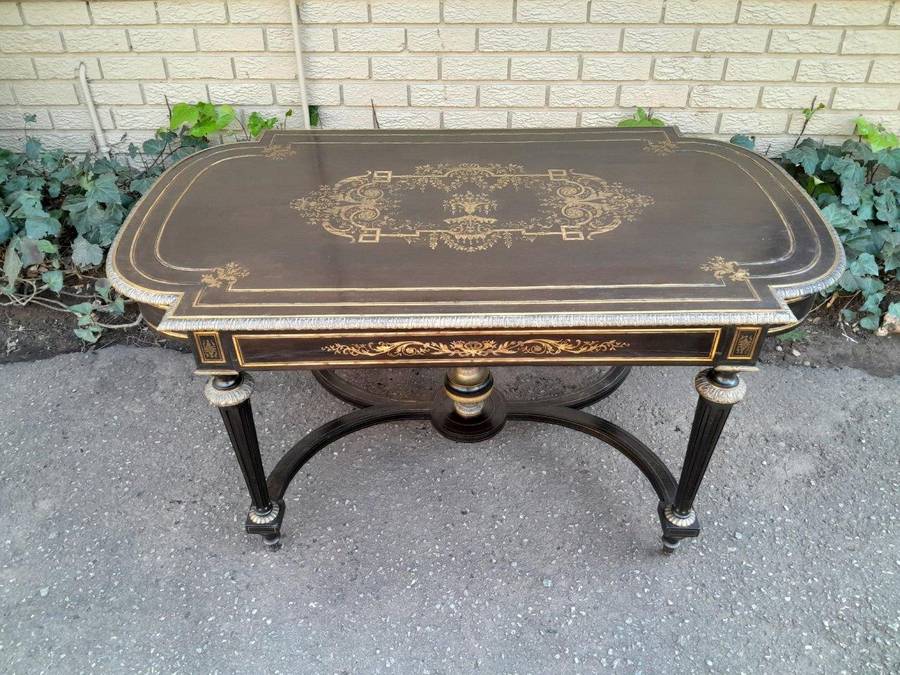 A 19th Century French Ebonised and Brass inlay and Metal Mounted Table with Drawer