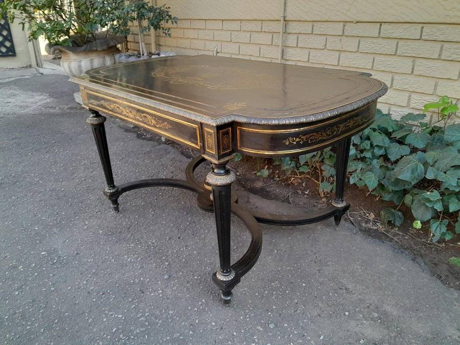 A 19th Century French Ebonised and Brass inlay and Metal Mounted Table with Drawer