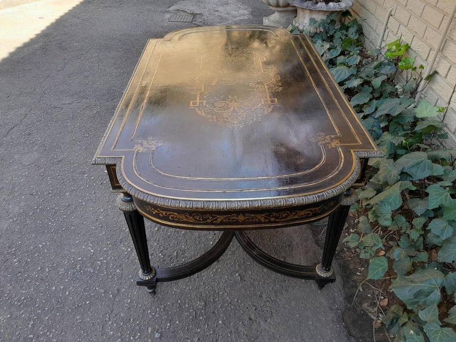 A 19th Century French Ebonised and Brass inlay and Metal Mounted Table with Drawer