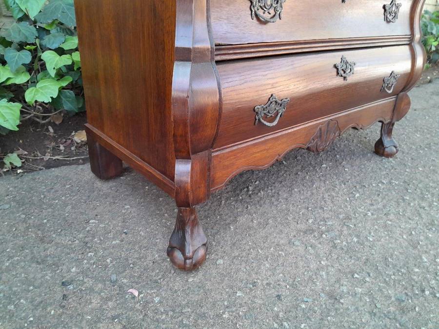 A 19th Century French Provincial Louis XVI-style Oakwood Bombe Chest of Drawers with Galala Cream...