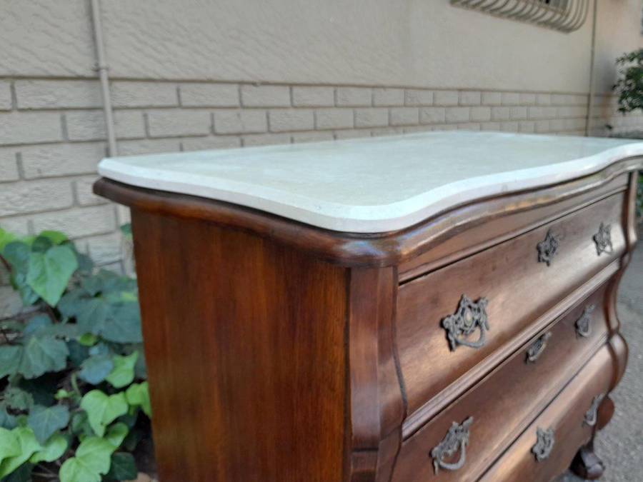 A 19th Century French Provincial Louis XVI-style Oakwood Bombe Chest of Drawers with Galala Cream...
