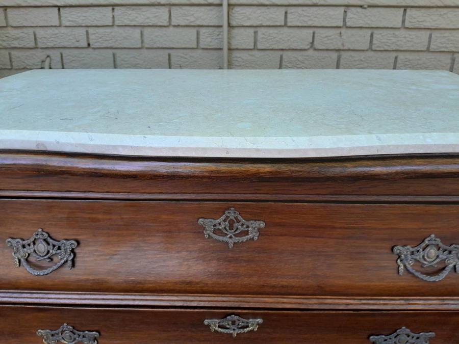 A 19th Century French Provincial Louis XVI-style Oakwood Bombe Chest of Drawers with Galala Cream...