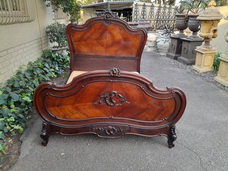 A 20th Century French Ornately Carved Rosewood Double Bed with Headboard, Footboard and Side Rails