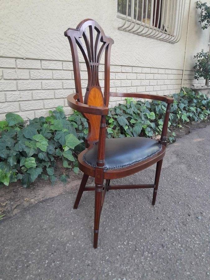 An Antique Inlaid Mahogany Arm-Chair