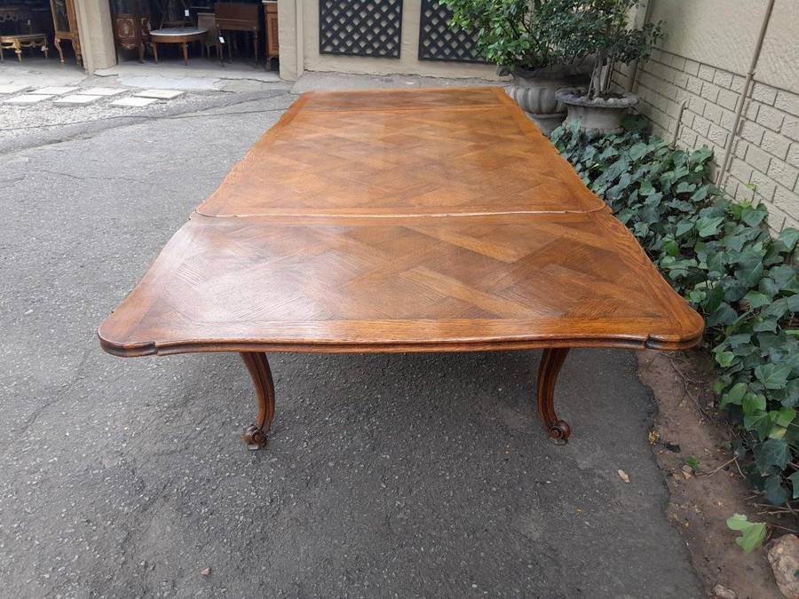 A 20th Century French  Carved Oak Extension Dining Table / Entrance Table / Table  with Two Lea...