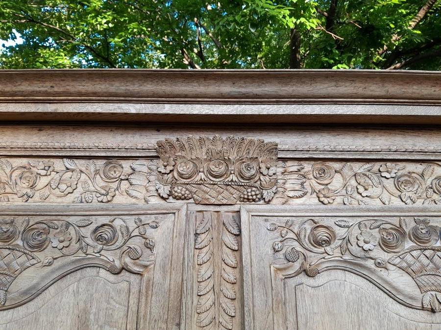 A 19th Century French Carved Oak Armoire With Drawers And Shelves