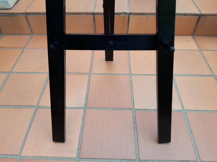 A Decorative Wooden Display Easel In An Ebonized Contemporary Finish