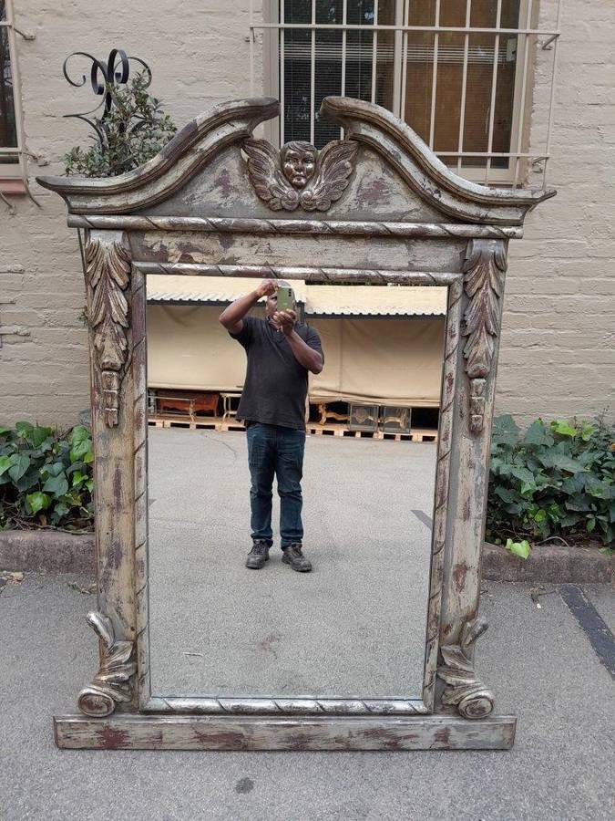 A French Style Heavily Carved And Hand Gilded With Gold Leaf Mirror