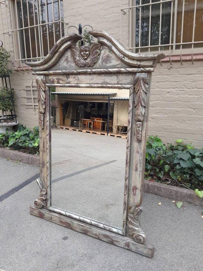 A French Style Heavily Carved And Hand Gilded With Gold Leaf Mirror