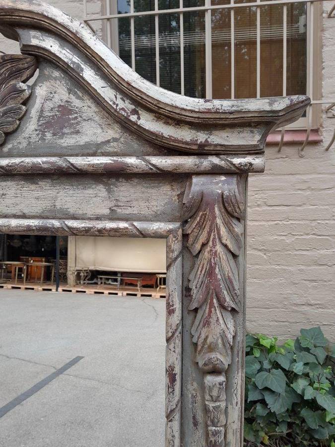 A French Style Heavily Carved And Hand Gilded With Gold Leaf Mirror