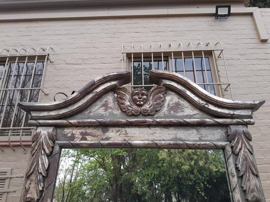 A French Style Heavily Carved And Hand Gilded With Gold Leaf Mirror