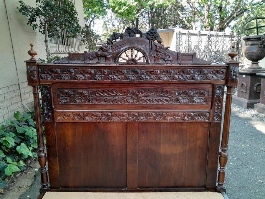 An Antique French Brittany Heavily Carved Oak Bed