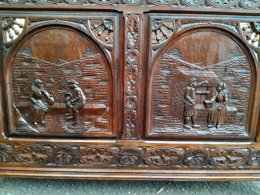 An Antique French Brittany Heavily Carved Oak Bed