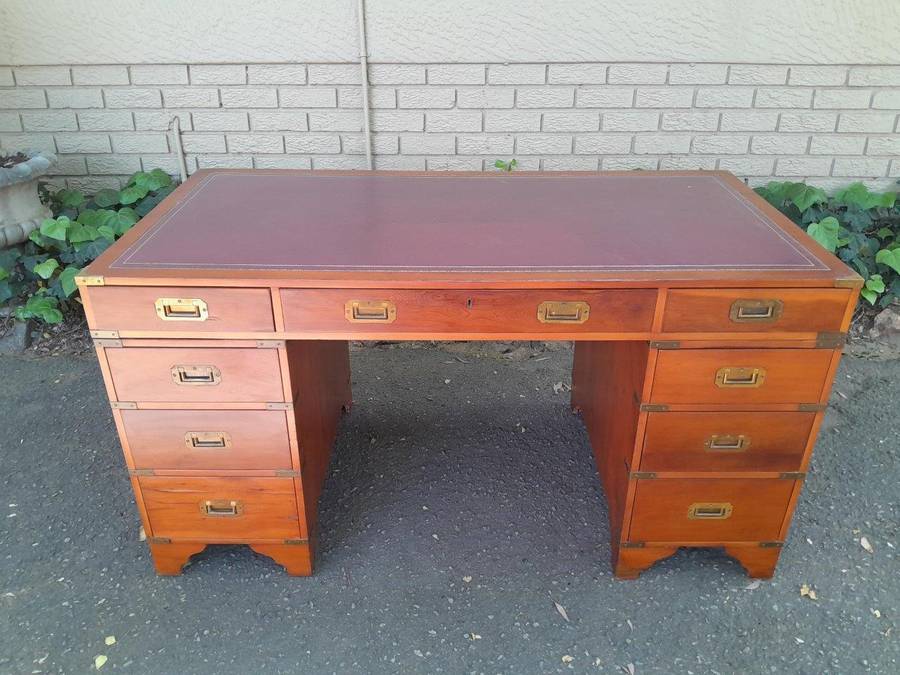 A 20th Century Teak Military Style Desk With Tooled Leather Top
