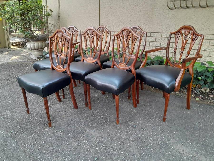 A 20th Century Set Of Eight Regency Style Carved Mahogany Chairs (Comprising Six Dining Chairs An...